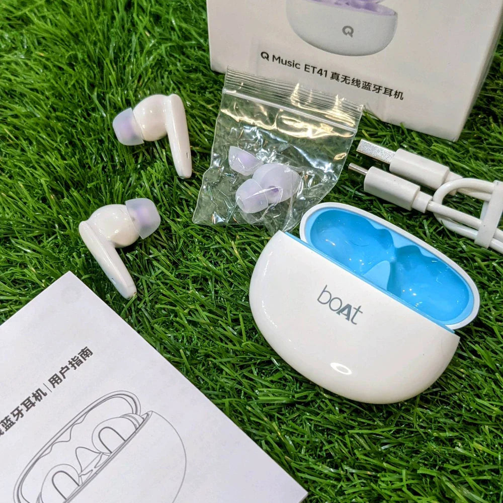 boAt wireless earbuds with charging case on grass