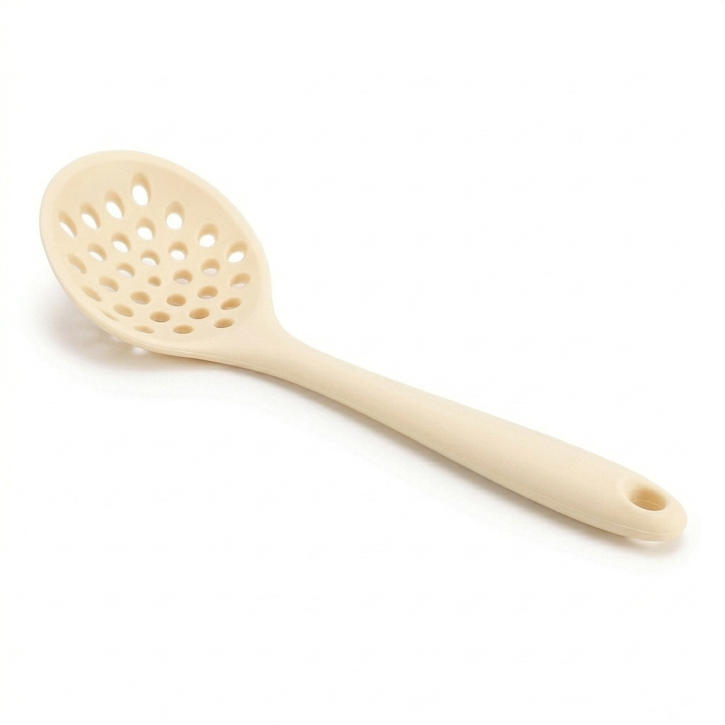 slotted spoon on a white background