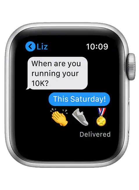 Smartwatch displaying a text message from Liz asking about a 10K run, with a response and emojis.